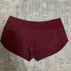 Red lululemon speed up shorts size 10.